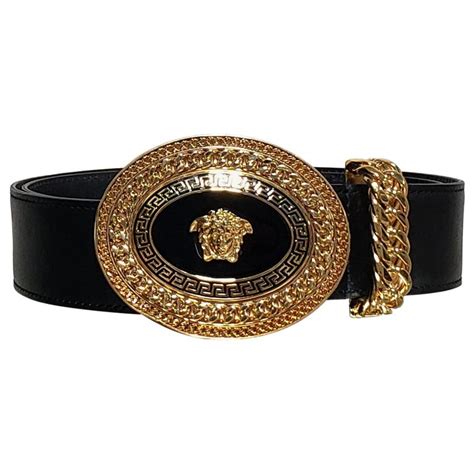 versace collection black leather & gold-tone detail belt|Versace leather boots.